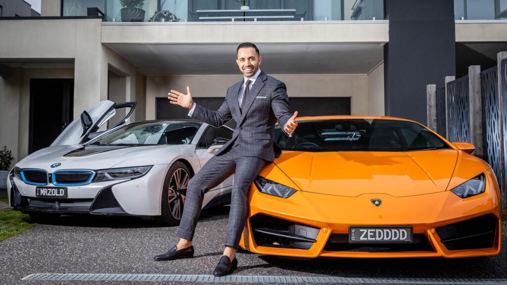 Real-estate-agent-img-with car